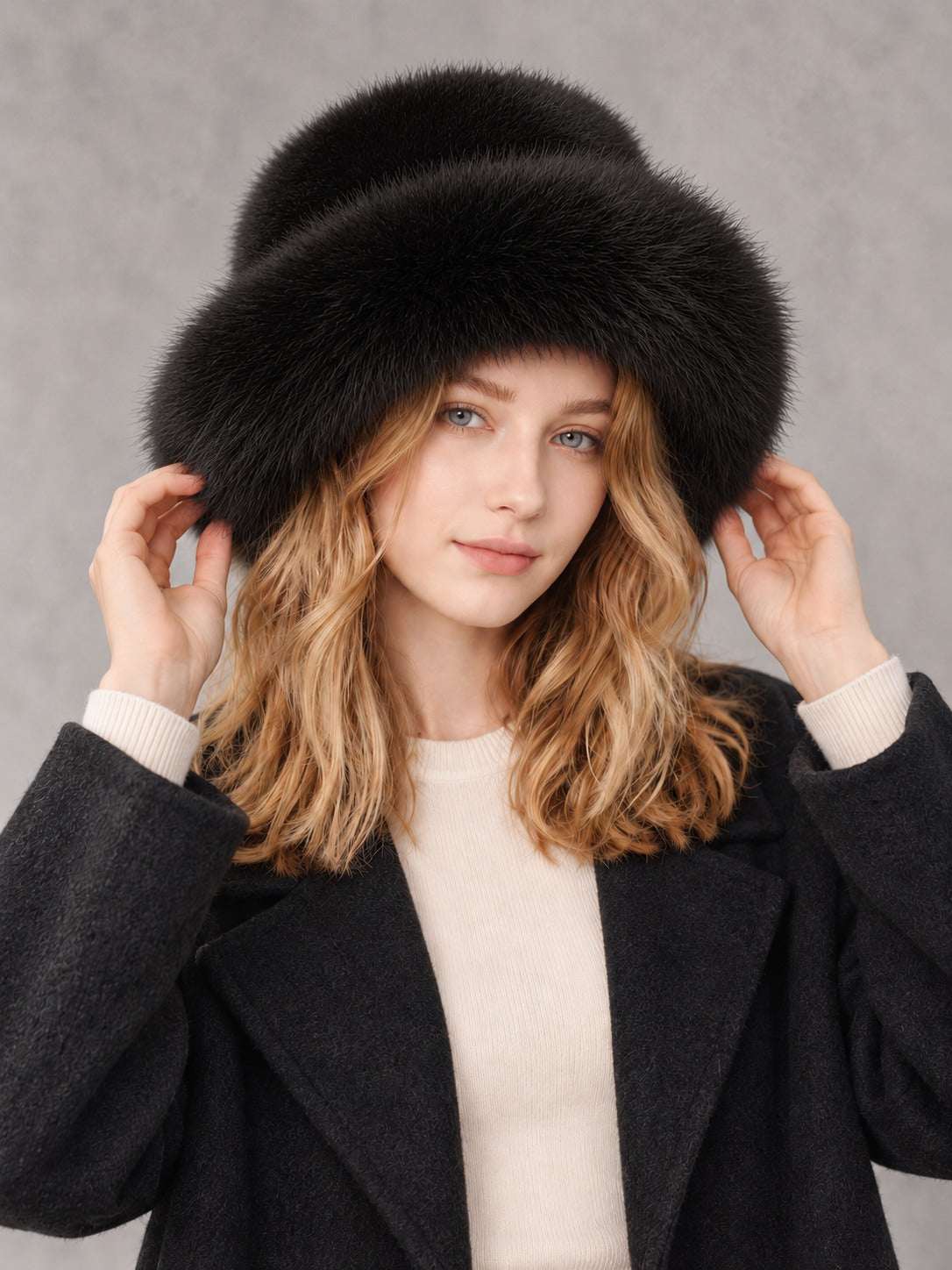 Faux Fur and Knit Bucket Hat in Black (Faux Fur), styled on model