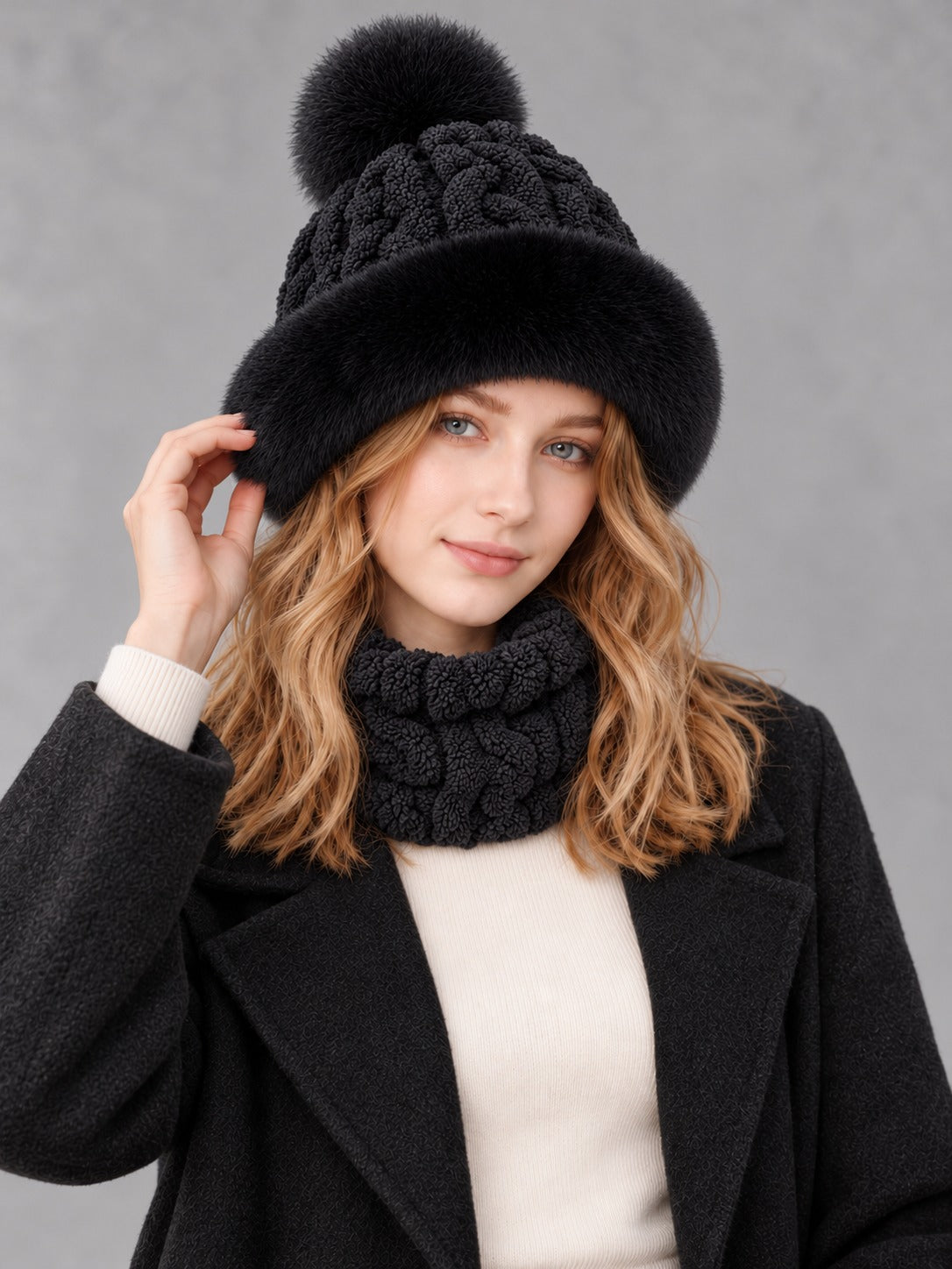 Faux Fur and Knit Bucket Hat in Black (Twist Knit), styled on model