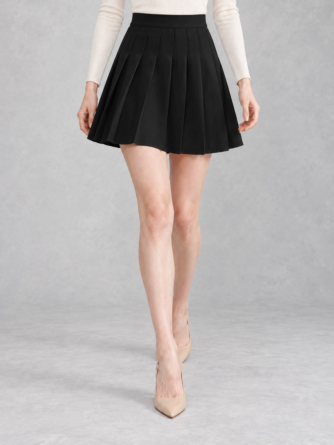 Pleated Pull-On Skirt in Black, styled on model