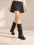 Buckled Mid-Calf Slouch Boots in Black, styled on model