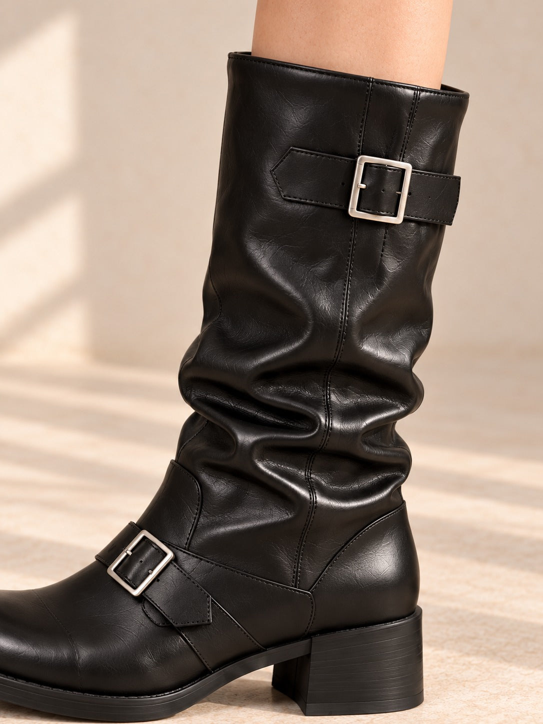 Buckled Mid-Calf Slouch Boots in Black, detail view