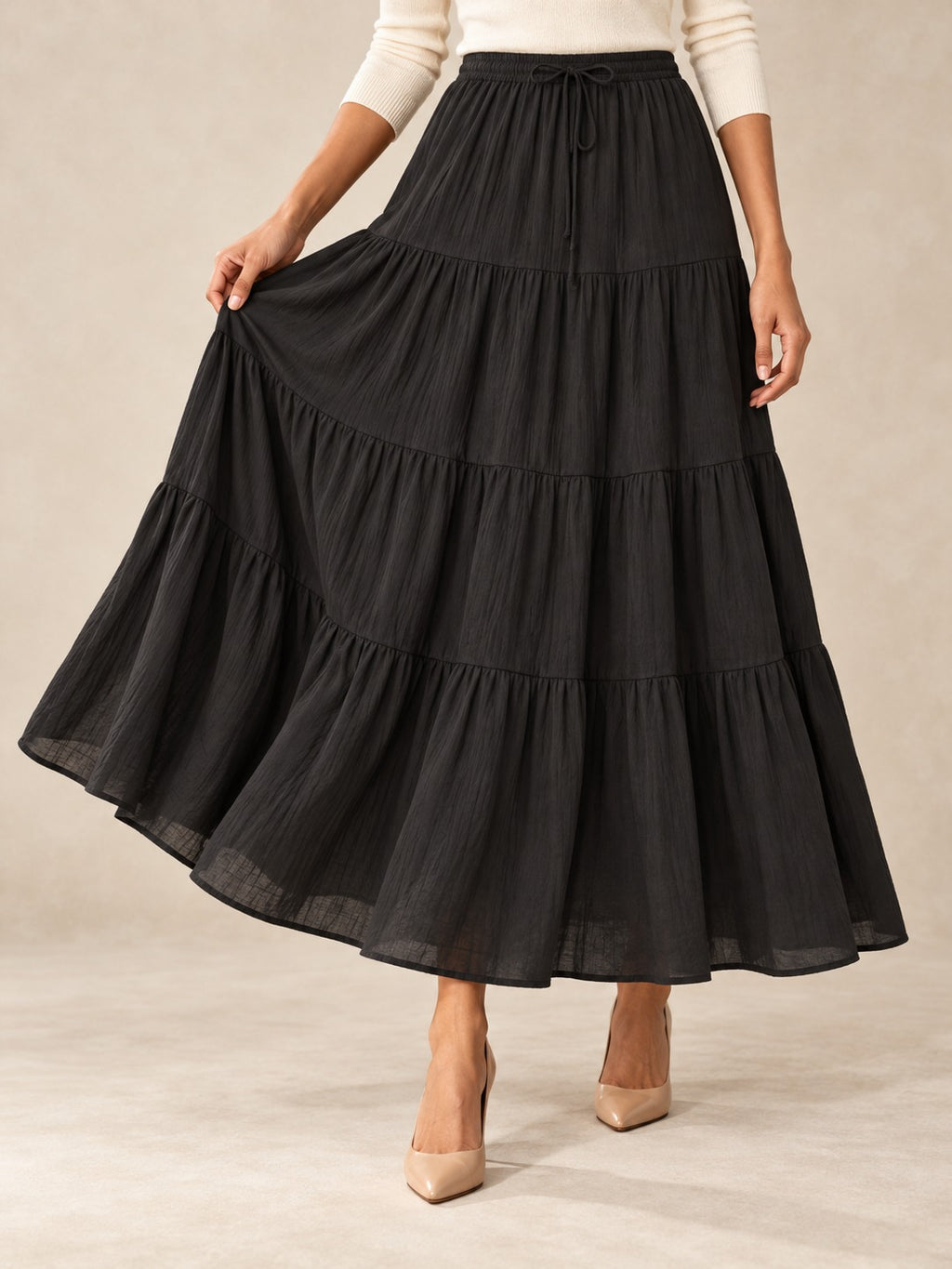 Tiered Cotton-Blend Maxi Skirt in Black, styled on model