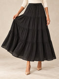 Tiered Cotton-Blend Maxi Skirt in Black, styled on model