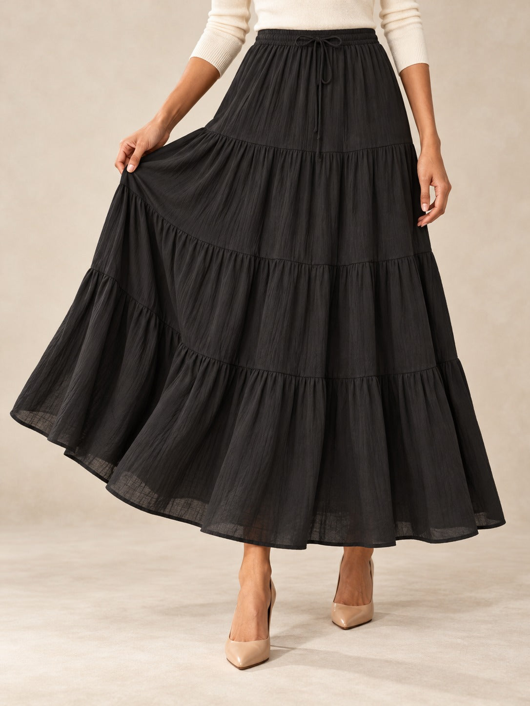 Tiered Cotton-Blend Maxi Skirt in Black, styled on model