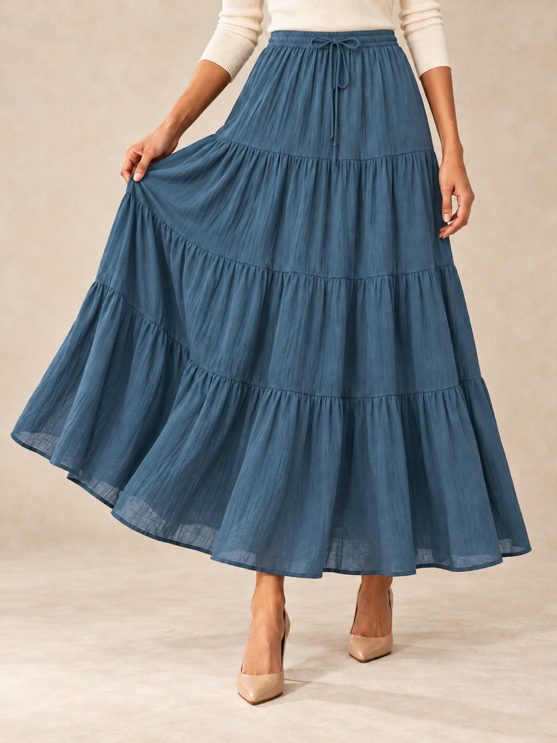 Tiered Cotton-Blend Maxi Skirt in Blue, styled on model