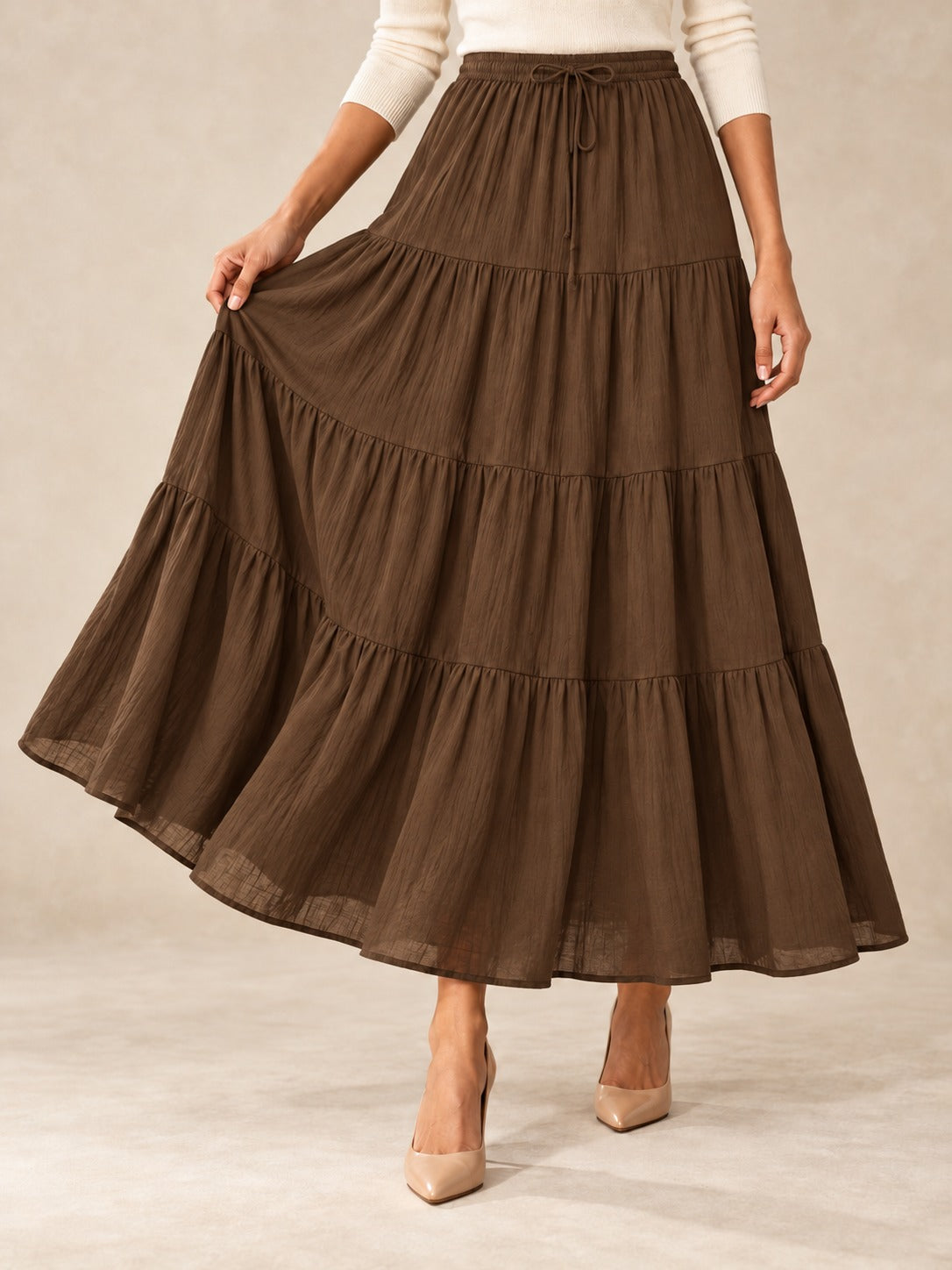 Tiered Cotton-Blend Maxi Skirt in Brown, styled on model